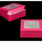 two pink boxes with one open and the other closed, on a black background each has a single piece of paper in it