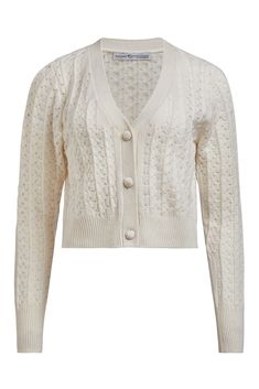 This long sleeve 100% cashmere cardigan is destined to be your new favorite vintage inspired, feminine sweater. Designed with covered yarn buttons, overall pointelle details, and ribbed crewneck, hem, and cuffs, she can easily be worn with jeans as well as over floaty fall dresses. 100% cashmere Designed in New York Knitted in China Rib stitch detail at hem and cuff Model is size 2, 5'10 and wearing an XS. Hand wash and lay flat to dry or dry clean Also comes in French Navy, Postbox, and Haystac Cable Knit Pattern, White Jumper, White Cardigan, Knit Sweatshirt, Knit Pattern, Cashmere Cardigan, Knitwear Cardigan, Cropped Cardigan, Independent Designers Fashion