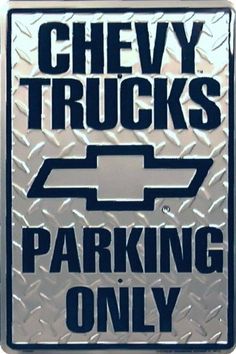 a chevrolet truck parking only sign is shown