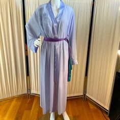 Size Large Lavender Chiffon Polyester Luxurious Robe For Glamorous Lounging. Does Not Include Tie Belt, But You Can Make One From A Thick Ribbon, Or Borrow From Another Robe In Your Closet, As I Did For These Photos. Has An Inside Tie. Collar And Sleeves Are Trimmed In Satin Polyester. Jc Penney Tag Attached, Brand Is Sophia By Delicates. Nwt Purple Silk Robe, Purple V-neck Party Sleepwear, Spring V-neck Home Robe, Satin V-neck Robe For Loungewear, Purple V-neck Nightgown For Loungewear, Vintage Lavender, Tie Collar, Belt Tying, Tie Belt