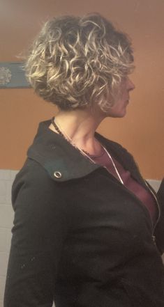 Short Curly Wedge Hairstyles, Curly Hair Wedge Haircut, Layered Chin Length Bob Curly, Short Curly Inverted Bob Stacked, Graduated Curly Bob Haircut, Curly Wedge Haircut Stacked, Curly Bobs For Older Women, Layered Wavy Bob, Choppy Bob Hairstyles For Fine Hair