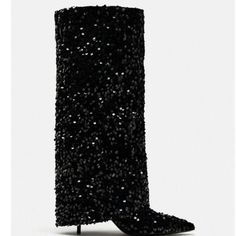 Velvet Knee High Boots With Sequins. Gaiter Detail. Pointed Toe. Heel Height: 2.8 Inches (7 Cm) Black Heeled Boots For Winter Evenings, Glamorous Winter Boots With Sequins, Sequin Boots For Fall, Chic Sequined Pointed Toe Boots, Glamorous Formal Winter Boots, Chic Sequined Evening Boots, Fall Sequined Pointed Toe Boots, Chic Sequined Boots For Fall, Winter Party Knee-high Boots With Pointed Toe