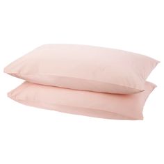 two pink pillows sitting next to each other