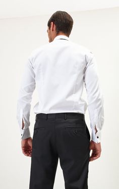 It is our flagship shirt and it's craftsmanship is why we make one of the best tuxedo shirts out there. It the shirt we proudly made for those happy days, for talents performing, grooms making the vow and graduates celebrating a new beginning. The pleats are hand made with the actual fabric of the shirt. Our design has an incredible hand sewn 27 pleats on each side of the shirt, and a fused placket in the center of the shirt. Then framed with a beautifully sawn tonal piping. The shirt is secured Cool Tuxedos, French Cuff, Tuxedo Shirts, Stud Set, Formal Shirts, Collar Shirts, Chef's Jackets, Pure Cotton, Hand Sewing