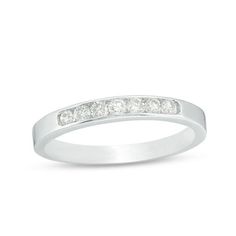 Celebrate your years of love with this shimmering diamond anniversary band. Crafted in sleek platinum, this classic look sparkles with seven channel-set diamonds along the center. Dazzling with 1/4 ct. t.w. of diamonds and a bright polished shine, this timeless anniversary band is a reminder she'll be delighted to accept. Modern Channel Set Eternity Band For Anniversary, Classic Channel Set Diamond Ring For Anniversary, Modern Eternity Band With Diamond Accents For Anniversary, White Gold Channel Set Eternity Band For Anniversary, Classic Channel Set Eternity Band For Promise, Diamond Anniversary Bands, Diamond Anniversary, Platinum Metal, Channel Set