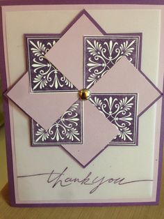 a purple and white greeting card with the words thank you