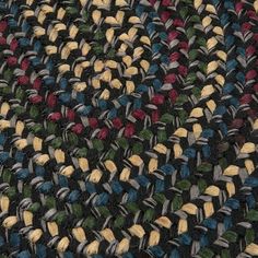 a multicolored area rug is shown in close up