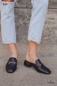 Step into quick style with the Lulus Ranae Black Slide-On Loafers! These cute mules have a squared toe, a notched collar, gold horsebit hardware, and an easy slide-on design. Low block heel lends just enough height to these chic loafer slides. 0. 5" wrapped block heel. Cushioned insole. Rubber sole has nonskid markings. Man made materials. Imported. Lulus | Ranae Black Slide-On Loafers. Gold Slip-on Mules For Work, Chic Horsebit Detail Slip-on Loafers, Gold Mules For Work, Chic Loafers With Horsebit Detail And Round Toe, Chic Loafers With Horsebit Detail, Fall Workwear Mules With Buckle Closure, Workwear Buckle Closure Mules For Fall, Workwear Buckle Closure Fall Mules, Workwear Fall Buckle Closure Mules