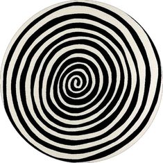 a black and white circular rug with an abstract design