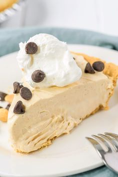 a piece of pie with whipped cream and chocolate chips on top