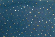 a blue background with gold stars on it