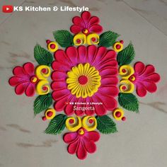 colorful flower design on the floor for diwaling