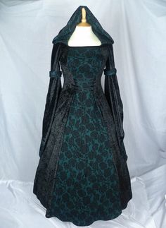 THIS DRESS WILL BE MADE TO YOUR MEASUREMENTS. PLEASE SEND ME YOUR BUST,WAIST AND HIP MEASUREMENTS AND ALSO PLEASE MEASURE FROM THE TOP OF YOUR SHOULDER TO THE FLOOR WITH SHOES. This dress will be made from beautiful black crushed velvet and Dark green with black jacquard fabric,it will have a corset style front and back with lacing. Combined shipping on multiple items. If you purchase express shipping by courier please send me your phone number thank you. Medieval Black Long Sleeve Dress, Black Medieval Long Sleeve Dress, Medieval Long Sleeve Black Dress, Medieval Style Long Sleeve Black Dress, Medieval Long Sleeve Party Dress, Black Fitted Medieval Dress Costume, Elegant Black Fitted Medieval Dress, Elegant Fitted Black Medieval Dress, Green Fitted Medieval Dress