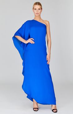 Our signature one shoulder cascade gown, cut in striking shades of silk georgette. This asymmetric gown glides gracefully over the body and is lined to the knee. Elastic under the arm allows for a comfortable and secure fit. Asymmetric Gown, Persian Blue, Go Blue, The Knee, One Shoulder Formal Dress, One Shoulder Dress, One Shoulder, Chiffon, Shades