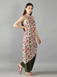 Ivory Floral Print Flower Lace Halter Neck Assymetrical Kurta with Olive Green Flared Pant Cotton ivory floral print kurta with flared pant set will always keep your work day or outing day stylish Assymetrical draw string kurta with halter neckline and flower lace detailing. Pant comes with two side pockets and back elastic wais band. Cotton cambric fabric for relaxed summer look Cold wash and Dry clean only Product doesn't have lining Lining Material: No lining Pattern: Floral Print Fit: Fitted Multicolor Floral Print Maxi Length Palazzo Set, Spring Palazzo Set With Printed Motifs In Maxi Length, Floral Print Maxi Length Palazzo Set For Spring, Spring Floral Print Maxi Length Palazzo Set, Sleeveless Cotton Palazzo Set For Summer, Fitted Floral Print Palazzo Set For Summer, Floral Print Cotton Sets In Maxi Length, Floral Print Cotton Maxi Sets, Lining Pattern