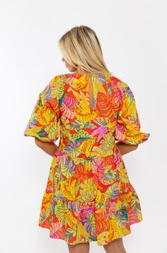 Add a pop of color to your wardrobe with our Tropical Palm Banana Dress. This eye-catching dress features a bold tropical print that will make you stand out in any crowd. The dress is lined for comfort and the puff sleeves add a touch of elegance. Stay stylish and comfortable with this must-have dress. Banana Dress, Tropical Palm, Pop Of Color, Tropical Print, Puff Sleeves, Puff Sleeve, Must Haves, Color Pop, The Dress