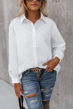 Getting dressed for the work week just got a little bit easier (and stylish) thanks to the "Good Karma" button down long sleeve blouse. Lightweight silky woven fabric shapes this classic top that features a collared neckline and long sleeves with drop shoulders and buttoned cuffs. A full button placket continues down the front of the relaxed bodice that ends a notched hem. Model is in a size small 85% Cotton and 15% Polyester Casual Layering Piece Lightweight Button Down Patterns May Vary Colors Versatile Long Sleeve Everyday Blouse, Versatile Long Sleeve Blouse For Everyday, Versatile Long Sleeve Office Shirt, Solid Long Sleeve Blouse For Everyday, Long Sleeve Blouse For Everyday, Long Sleeve Blouse For Everyday Wear, Elegant Long Sleeve Everyday Blouse, Versatile White Button-up Blouse, Relaxed Fit Long Sleeve Blouse For Business Casual