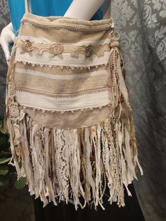 This stunning boho crossbody handbag has an extra long strap. Made from very durable materials with exterior and interior pockets It has a magnetic closure. . Bohemian Hobo Bag With Fringe For Travel, Bohemian Fringe Hobo Bag For Travel, Bohemian Travel Hobo Bag With Fringe, Bohemian Bags With Beaded Fringe For Everyday Use, Everyday Bohemian Fringe Shoulder Bag, Bohemian Fringe Shoulder Bag, Bohemian Hobo Bag With Tassels, Beige Fringed Hobo Tote Bag, Bohemian Shoulder Bag With Fringe For Travel