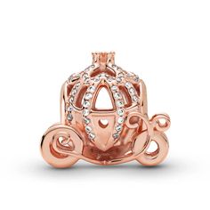 Show up to the ball in style with the Disney Cinderella Sparkling Carriage Charm. Designed to celebrate the 70th anniversary of Disney’s Cinderella, this piece is hand-finished in 14K rose gold-plating. Shaped like her pumpkin carriage, this openwork charm is decorated with clear cubic zirconia and features a 3D crown on its roof and ornamental wheels. Style this charm on your Pandora Moments bracelet with shimmering pieces in sterling silver for a magical mixed metal look. Pandora Christmas, Pandora Logo, Pandora Rose, Pumpkin Carriage, Charms Pandora, Pandora Disney, Disney Cinderella, Bracelet Pandora, New Charmed