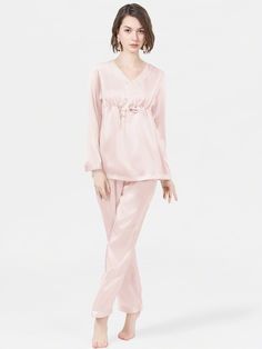 Made from the luxurious mulberry silk, the long silk pajama set decorated with a feminine ribbon under the bust brings a visual hi lite. A modern yet elegant creation that lends pure opulence to your nightwear collection. Elegant V-neck Loungewear Sets, Elegant Sleepwear For Pajama Party, Feminine Satin Sleepwear Sets, Elegant V-neck Night Sets, Elegant Satin Sets For Pajama Party, Elegant Satin Sleepwear For Pajama Party, Elegant Pink Loungewear Set, Feminine Silk Sleepwear, Elegant Satin Sets With Long Pants