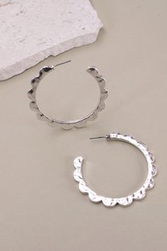 Designed Edge Hoop Earrings a pair of hoop earrings with a distinctive and carefully crafted design, featuring unique edges that set them apart from traditional hoop styles. The key feature of these earrings is the carefully designed edges that deviate from the typical smooth and circular shape of traditional hoops. The edges may incorporate intricate patterns, geometric shapes, or other decorative elements, adding a touch of artistry and uniqueness to the overall design.Product Details:length: Post Metal, Sunglass Chain, Graphic Apparel, Decorative Elements, Makeup Storage, Cosmetic Pouch, Color Calibration, Design Product, Color Collection