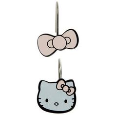 two hello kitty hangers with bows on each one and an image of a cat hanging from the top