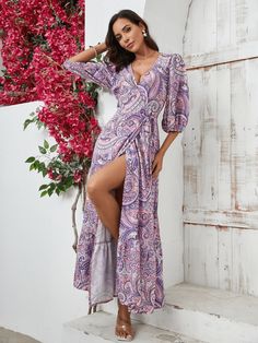 This paisley maxi dress will make you the star of any western wonder! The vibrant print and flowy silhouette will have you feeling free and fearless, while the low V-neckline and quarter sleeves add a touch of elegance. Perfect for a day out in the sun or a night out under the stars. Size Guide: Model is 5’8” tall, and has a 33.4” bust, 26.4” waist, & 35.4” hips. She is wearing a S / US 4 / AU 8. This dress is true to size. Material: 100% Polyester Feature: V-Neckline. Ruffle Bell Sleeves. Swirl Paisley Print. Side Slit. Waist Tie Detail. Wrap dress. Maxi length. Not lined. Relaxed fit. Care Instructions: Machine wash / Cold hand wash Bohemian Half Sleeve Maxi Dress For Beach, Bohemian Maxi Dress With Surplice Neckline, Printed Maxi Dress With 3/4 Sleeve For Vacation, Fitted Half Sleeve Maxi Dress For Beach, Printed 3/4 Sleeve Maxi Dress For Vacation, Printed 3/4 Sleeve Maxi Dress For Beach, Purple Boho Print Maxi Dress For Summer, Bohemian Maxi Dress With Surplice Neckline For Vacation, Fitted Paisley Print Maxi Dress With V-neck