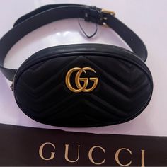 Gorgeous And Ever So Popular Gucci Marmont Belt Bag! Pre-Loved But Like New Condition! Excellent! Comes With: Certificate Of Authenticity And Entrupy Verified And Gucci Dust Bag. This Is A Staple In Anyone’s Closet And Literally Goes With Anything! I Purchased From A Luxury Reseller But Got The Same Exact One As A Gift So Selling This Beauty To One Lucky Person! Callouts: Small Stain Inside Bag (See Photo) Otherwise Everything Looks Like New Still. Belt Size: 75 (30 Inch Waist) But Belt Is Removable And You Can Use Your Own Like I Did. The True Star Is The Beautiful Marmont And Signature Gg Logo. Classic Gucci Bags With Gold-tone Logo Plaque, Luxury Gucci Bag With Gold-tone Logo Plaque, Elegant Gucci Bag With Gold-tone Logo Plaque, Elegant Bag With Designer Logo For Everyday Use, Elegant Everyday Shoulder Bag With Designer Logo, Elegant Bags With Designer Logo, Luxury Black Bag With Designer Logo, Designer Gucci Bag With Logo, Quilted Belt Bag