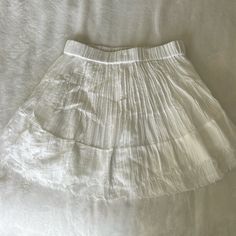 Flowy White Linen Skirt Perfect For The Summer Size: Small No Tags But Never Worn. Selling Because I Have No Need For It Summer Full Skirt For Daywear, Daywear Mini Skirt With Lace Trim, Cotton Lined Mini Skirt For Daywear, Daywear Short Length Skort, Relaxed Short Skort For Daywear, Stretch Mini Skirt For Daywear, Short Relaxed Lined Skirt, Cotton Mini Skirt For Daywear, Summer Daywear Skirt