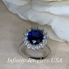 "The ring pictured is lab created blue sapphire with moissanite halo #6248 Rose Gold is available upon request as a custom order and is a final sale (non refunable, non returnable, non exchangeable) Moissanite may take up to 5 to 10 business days to complete and ship, sometimes sooner. -Approximate total carat weight: approx. 5.05ctw diamond equivalent -Center Stone Size: 11x9mm - approx. 4.20ct diamond equivalent -Center Stone Shape: oval -Gem Type: lab created sapphire -Stone Clarity: VS2 -Sto Elegant Diamond Birthday Rings, Elegant Diamond Ring For Birthday, Elegant Jewelry With Center Stone For Birthday, Royal Blue Sapphire Ring With Diamonds For Anniversary, Anniversary Royal Blue Sapphire Ring Fine Jewelry, Royal Blue Sapphire Ring For Anniversary, Dazzling Gia Certified Sapphire Ring As Gift, Anniversary Royal Blue Sapphire Ring, Anniversary Halo Ring With Lab-created Sapphire