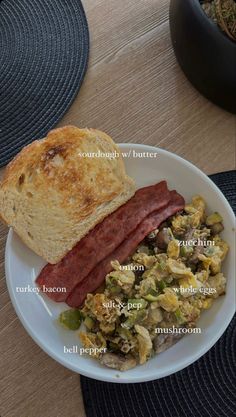 a breakfast plate with eggs, bacon, and toast on it next to a potted plant