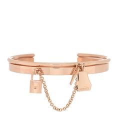 This is an authentic HERMES 18K Rose Gold PM Kelly Clochette Double Cuff Bracelet SH. The bracelet is crafted of 18 karat rose gold and features a 4mm cuff linked to a 2mm cuff with a chain and also features a lock, key and clochette charm. Luxury Rose Gold Bangle Cuff Bracelet, Luxury Rose Gold Cuff Bracelet, Luxury Rose Gold Cuff Bracelet For Formal Occasions, Luxury Rose Gold Cuff Bracelet For Formal Events, Elegant Rose Gold Cuff Bracelet, Hermes Charm, Hermes Bracelet, Hermes Jewelry, Double Cuff