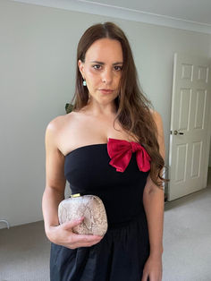 red bow, black maxi dress, snake skin bag Black And Red Dress, Snake Skin Bag, Black Maxi, Red Bow, Black Maxi Dress