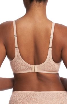 This contemporary bra offers lightweight, comfortable support with smooth stretch lace and soft jersey side panels that subtly shape. 77% nylon, 23% elastane Hand wash, line dry Imported Full Coverage Stretch Bra With Lace Closure, Stretch Lace Closure Full Coverage Bra, Solid Contoured Seamless Bra, Seamless High-stretch Nylon Bra, Beige Underwire Seamless Bra, Micro-elastic Soft Touch Solid Sports Bra, Solid Compressive Underwire Bra, Stretch Lace, Side Panels