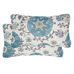 two blue and white pillows with floral designs on them, one is made from linen