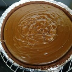 there is a chocolate pie on the cooling rack