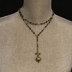 "SisterBeadsbyEllen is on vacation from June 30 until July 11. Please order with confidence - orders will ship on July 12. Thanks! 😊 ❤️❤️❤️ ON SALE 20% OFF - FREE SHIPPING ❤️❤️❤️ Unique mixed bead and crystal rosary chain lariat with antique gold heart and cross pendant. Made to order from 14-18 and in single or double strand. Drop with pendant is approximately 3\". Blue agate and mixed crystal beads make up this beautiful rosary chain. Approx. 4mm stones. Rustic heart pendant with cross is ant Bohemian Gold Cross Pendant Jewelry, Bohemian Cross Jewelry For Festival, Bohemian Heart-shaped Jewelry With Faceted Beads, Bohemian Cross Jewelry For Healing, Gold Heart Beads Jewelry For Festival, Bohemian Beaded Cross Pendant Jewelry, Bohemian Beaded Cross Pendant Necklace, Bronze Cross Bohemian Necklace, Bohemian Gold Jewelry With Heart Beads