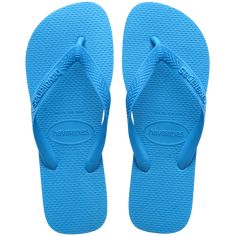 The Top flip flop is a summer staple. In three classic colors, this iconic style will take them through beach days, pool days, and lazy hang around the neighborhood days. Featuring Havaianas signature rubber sole for comfort and a tonal logo for a monochrome look. •Top Flip Flops: Our Top Flip Flops are the ultimate choice for Men, Women and Kids, taking you seamlessly from beach days and poolside lounging to leisurely neighborhood walks. •Unrivaled Comfort: These Flip Flops offer unparalleled c Top Azul, Turquoise Top, Logo Azul, Rubber Flip Flops, Kids Flip Flops, Havaianas Flip Flops, Block Style, Marine Blue, Soft Rubber