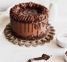 a chocolate cake sitting on top of a table