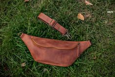 Leather fanny pack for men and women is our new item. We have made it in two colours- brown and white. As for me, it is very comfortable leather bag for any occasion. Just take it and forget. You can put inside your phone, passport and other necessary things. DESCRIPTION - zipper closure - regulated strap - one pocket outside Dimensions Length - 20 cm/7.9 inch Height - 11 cm/4.33 inch Depth - 6 cm/2.4 inch Brown Pouch Belt Bag For Outdoor, Brown Belt Bag With Zipper Pocket For Everyday, Outdoor Brown Belt Bag With Zipper Pocket, Brown Pouch Belt Bag With Zipper, Brown Belt Bag With Zipper Pouch, Outdoor Brown Belt Bag With Removable Pouch, Brown Belt Bag With Adjustable Strap For Outdoor, Brown Belt Bag With Adjustable Strap For Everyday, Brown Chest Bag With Belt Loops For Everyday Use