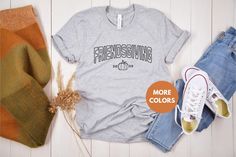 Celebrate in style with our matching Friendsgiving 2024 shirts! Perfect for your Friendsgiving squad, this cute group shirt brings a fun and festive vibe to your Thanksgiving gatherings. Whether you're cooking, dining, or just enjoying each other's company, these matching Thanksgiving tees are a must-have. Make your fall season even more special by grabbing one for every member of your friends group. STYLE + SIZING ★ UNISEX Bella+Canvas 3001 T-Shirt ★ Colors may vary (see photo card for more inf Fall Team Spirit T-shirt With Crew Neck, Fall Team Spirit Short Sleeve T-shirt, Relaxed Fit School Spirit T-shirt For Fall, Team Spirit Short Sleeve T-shirt For Fall, Fall School Spirit T-shirt With Screen Print, Friendsgiving Shirt, Thanksgiving Tee, Friends Group, Group Shirts