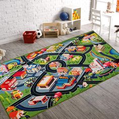 a child's play area with toys and rugs on the floor, including a toy train set