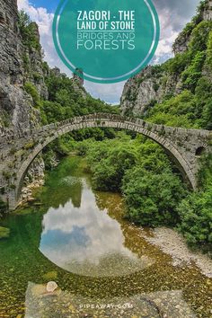 a stone bridge over a river surrounded by trees and rocks with the words zagori the land of stones