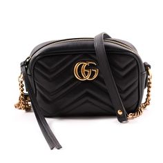 Description: Gucci Marmont Matelassé Mini Cross Body Bag Details: Black Matelasse Chevron Leather / Gold-Tone Hardware / Adjustable Long Shoulder Strap / Double G Logo at Front / Micro-Fiber Suede Interior Lining / Slit Pocket at Inside / Zip Closure at Top In Stores Now Includes Dustbag As Shoulder Bag or Cross Body Measurement: Width 7inch / Height 5inch / Depth 2.5inch Condition: Pre/Loved in Very Good Condition. Minor Marks on the GG Logo Estimated Retail: $980 Feel like trying before buying? Contact us on bagsarenaon@gmail.com or +1 307 216-5225 and we will arrange for same day viewing at our office. Gucci Marmont Matelasse Mini, Gucci Marmont Matelasse, Camera Purse, Mini Cross Body Bag, Double G Logo, G Logo, Mini Cross, Gucci Marmont, Gg Logo