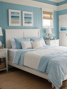 a bedroom with blue walls and white furniture