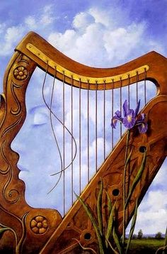 a painting of a harp with a purple flower in the middle and an image of a person's face on it