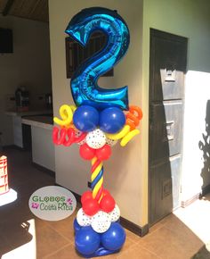 the number two balloon sculpture is made out of balloons