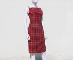 "Mid century sheath dress. Structured and shapely silhouette. High neckline, double spaghetti shoulder straps. Woven plaid pattern. Red acetate lining. Coordinating back metal zipper. Hook and eye. Reminds me of Vivienne Westwood. Label ET Jrs California by Elaine Terry. + Condition: good, signs of age and wear. Previous owner shortened shoulder straps and stitched them rather crudely to the inside front of dress (see photos). Holes on lining where shortened straps were reattached. Pinholes on s Metal Zipper, High Neckline, Dress Clothes For Women, Vivienne Westwood, Vintage 1950s, Plaid Pattern, Aging Signs, Sheath Dress, Shoulder Straps