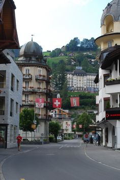 an empty street with buildings on both sides