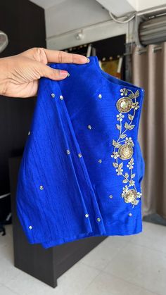 Product Descriptions : Royal blue silk blouse comes with intricate floral motif hand work for back & tikki works all over the blouse as shown View this post on Instagram A post shared by Handcrafted Sarees by Shobana Nithin (@threadslabel_india) Semi-stitched Silk Blouse Piece With Dabka Work, Silk Blouse Piece For Designer Wear During Navratri, Bollywood Style Dabka Work Kurta Blouse, Festive Straight Kurta Blouse With Dabka Work, Party Blouse With Dabka Work For Diwali, Diwali Party Blouse With Dabka Work, Bollywood Style Silk Blouse Piece With Resham Embroidery, Bollywood Silk Sets With Unstitched Blouse, Designer Silk Blouse Piece With Dabka Work